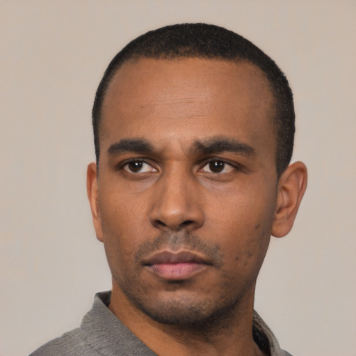 Neutral latino adult male with short  black hair and brown eyes