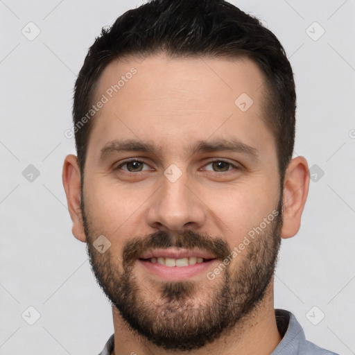 Joyful white young-adult male with short  brown hair and brown eyes