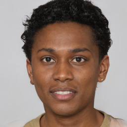 Neutral black young-adult male with short  brown hair and brown eyes