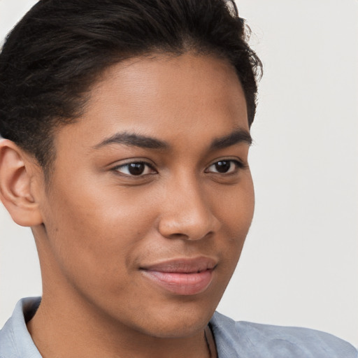 Joyful latino young-adult female with short  brown hair and brown eyes