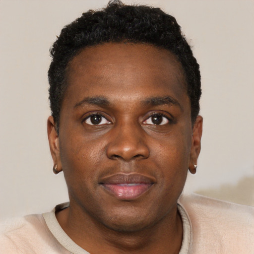Neutral black young-adult male with short  brown hair and brown eyes