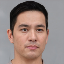 Neutral asian young-adult male with short  brown hair and brown eyes