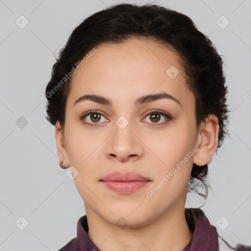 Joyful latino young-adult female with long  brown hair and brown eyes