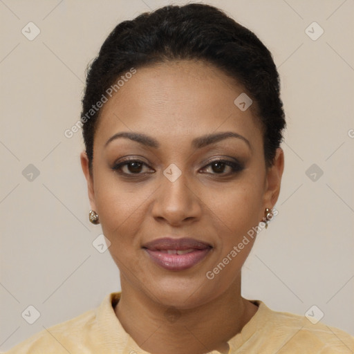 Joyful black young-adult female with short  brown hair and brown eyes