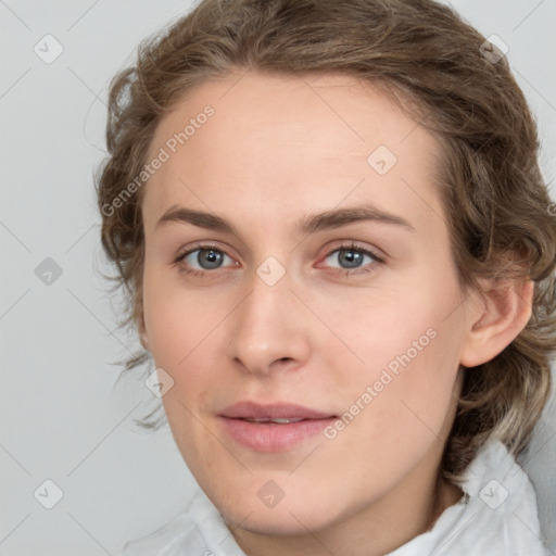 Joyful white young-adult female with medium  brown hair and blue eyes