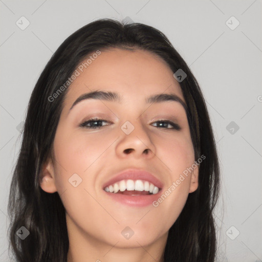 Joyful white young-adult female with long  black hair and brown eyes