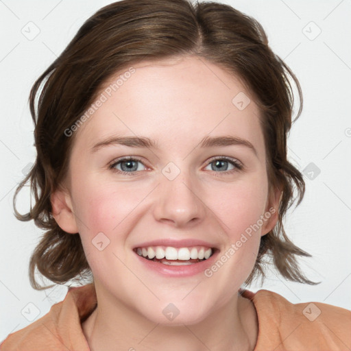 Joyful white young-adult female with medium  brown hair and blue eyes