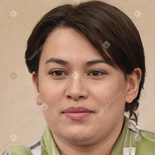 Joyful white adult female with medium  brown hair and brown eyes