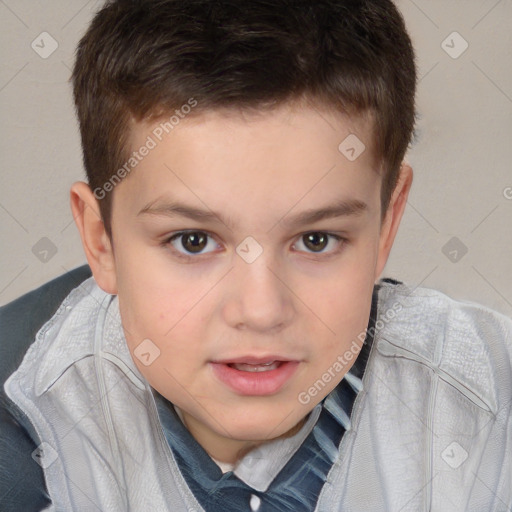 Joyful white child male with short  brown hair and brown eyes