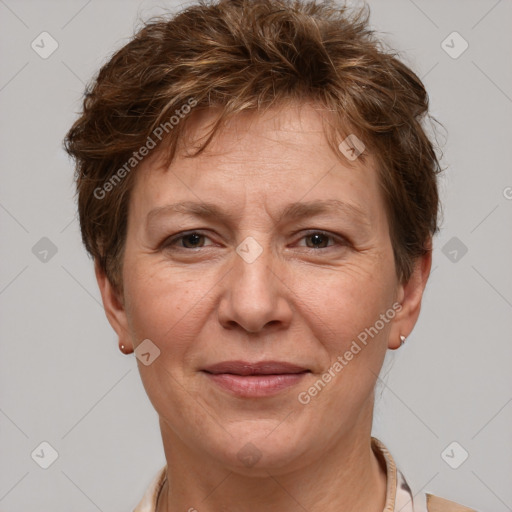 Joyful white adult female with short  brown hair and grey eyes