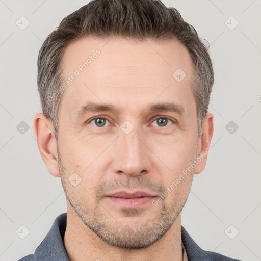 Neutral white adult male with short  brown hair and brown eyes