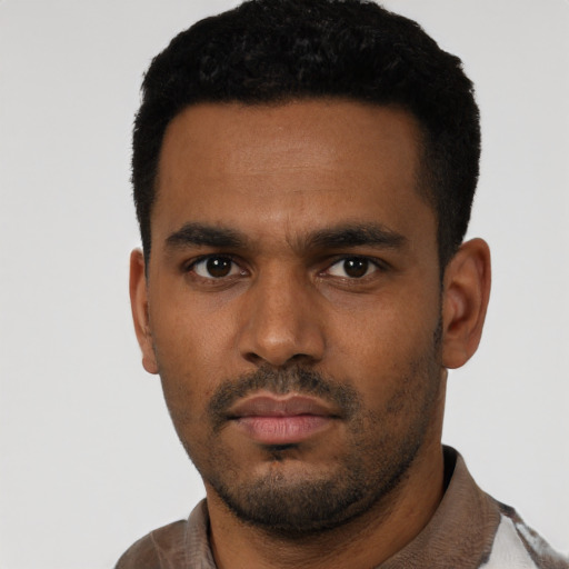 Neutral latino young-adult male with short  black hair and brown eyes