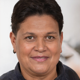 Joyful white adult female with short  brown hair and brown eyes