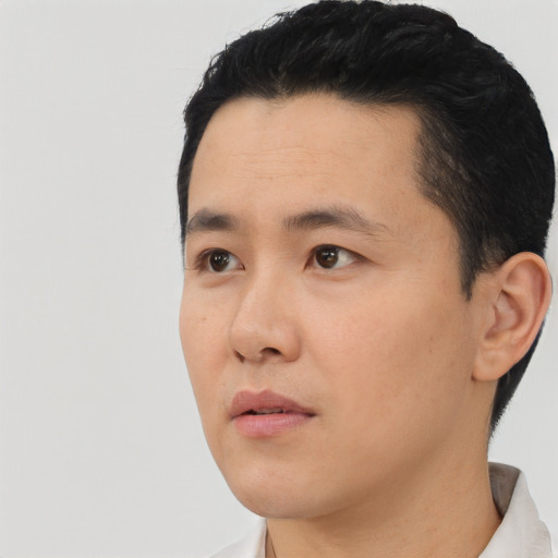 Neutral asian young-adult male with short  black hair and brown eyes
