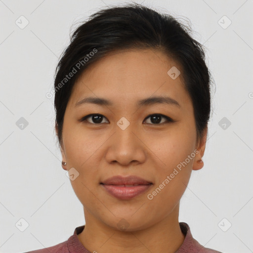 Joyful asian young-adult female with short  brown hair and brown eyes