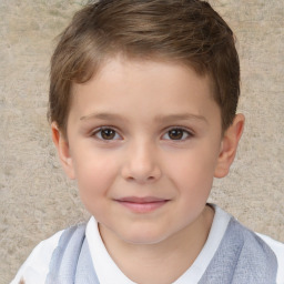 Joyful white child male with short  brown hair and brown eyes