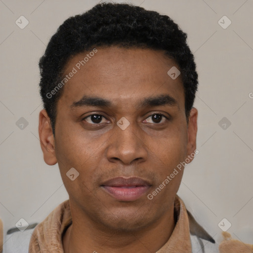 Joyful black young-adult male with short  black hair and brown eyes