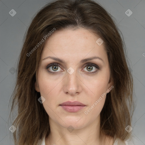 Joyful white young-adult female with medium  brown hair and green eyes