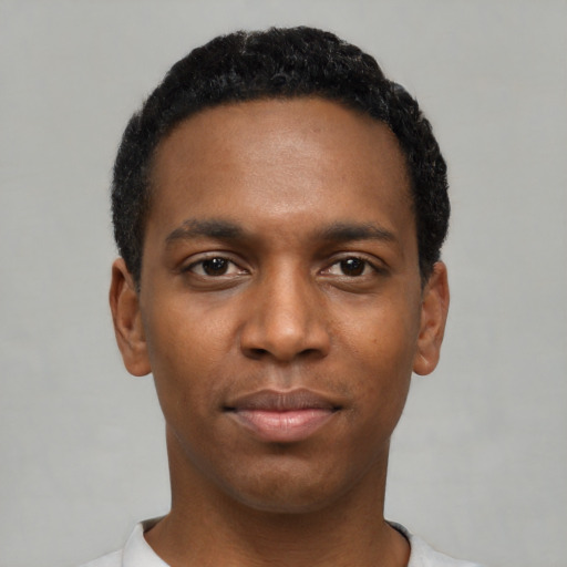 Neutral black young-adult male with short  black hair and brown eyes