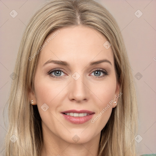 Joyful white young-adult female with long  brown hair and grey eyes