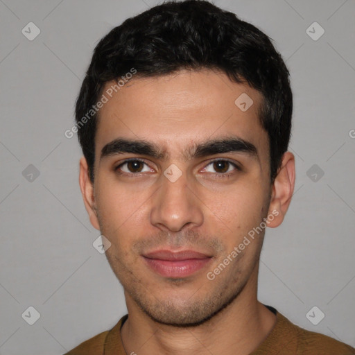 Joyful white young-adult male with short  black hair and brown eyes