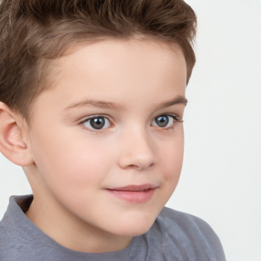 Joyful white child female with short  brown hair and brown eyes