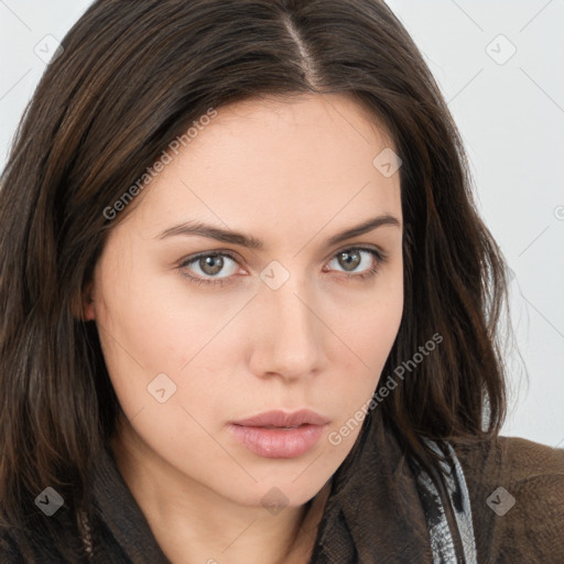 Neutral white young-adult female with long  brown hair and brown eyes