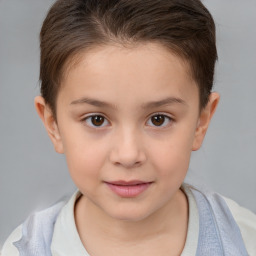 Joyful white child female with short  brown hair and brown eyes