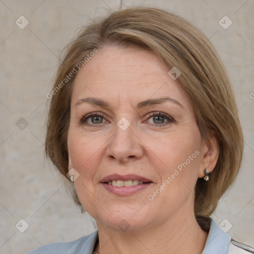 Joyful white adult female with medium  brown hair and grey eyes