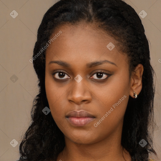 Neutral black young-adult female with long  black hair and brown eyes