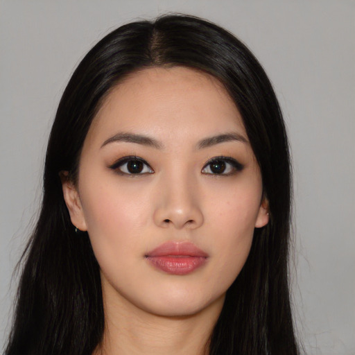 Neutral asian young-adult female with long  black hair and brown eyes