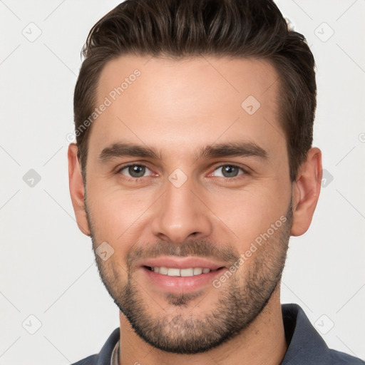 Joyful white young-adult male with short  brown hair and brown eyes