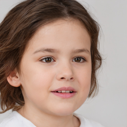 Joyful white child female with medium  brown hair and brown eyes