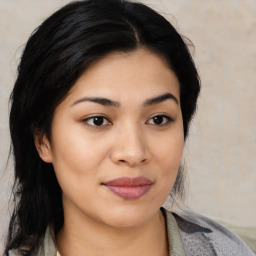 Joyful asian young-adult female with medium  black hair and brown eyes