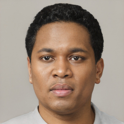 Neutral black young-adult male with short  black hair and brown eyes