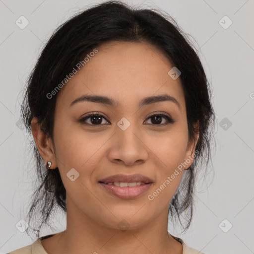 Joyful latino young-adult female with medium  brown hair and brown eyes