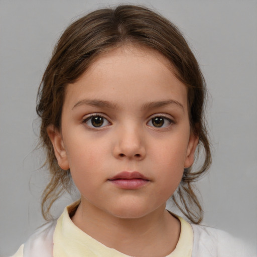 Neutral white child female with medium  brown hair and brown eyes