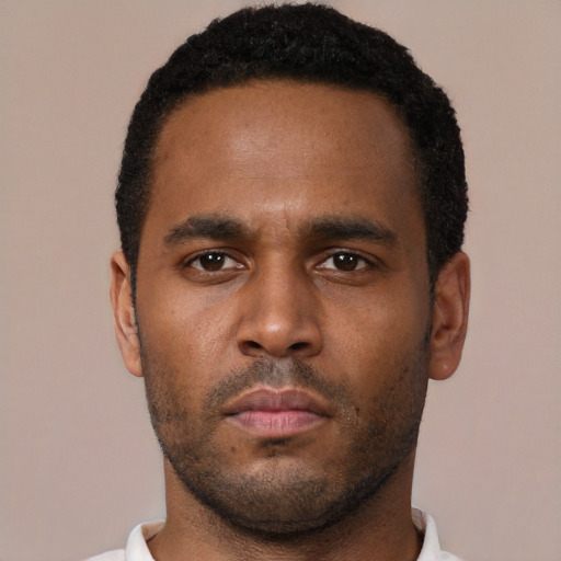 Neutral black young-adult male with short  brown hair and brown eyes
