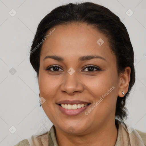 Joyful latino young-adult female with medium  brown hair and brown eyes