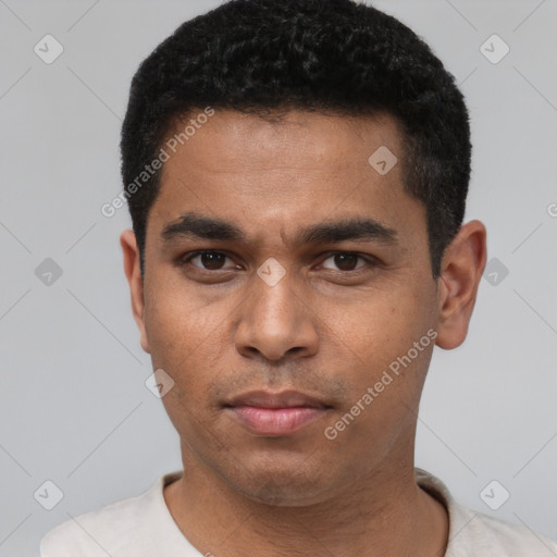 Neutral white young-adult male with short  black hair and brown eyes