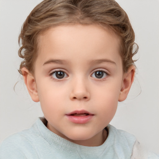 Neutral white child female with short  brown hair and brown eyes