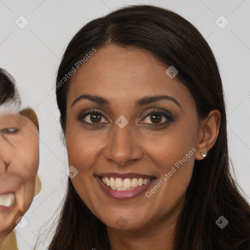 Joyful white young-adult female with long  brown hair and brown eyes