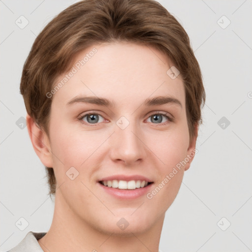 Joyful white young-adult female with short  brown hair and grey eyes