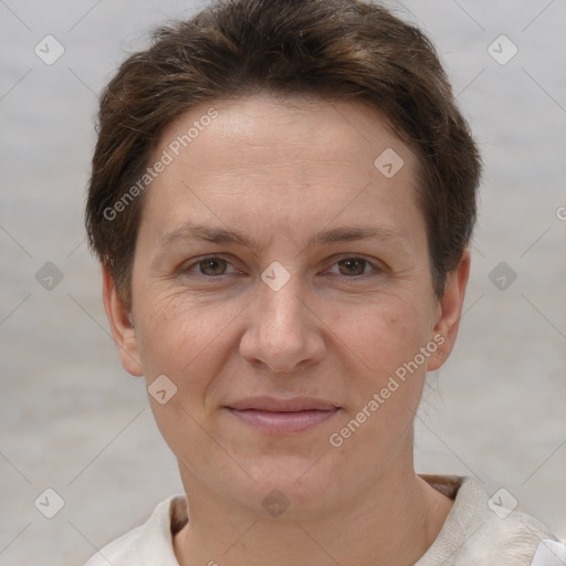 Joyful white adult female with short  brown hair and brown eyes