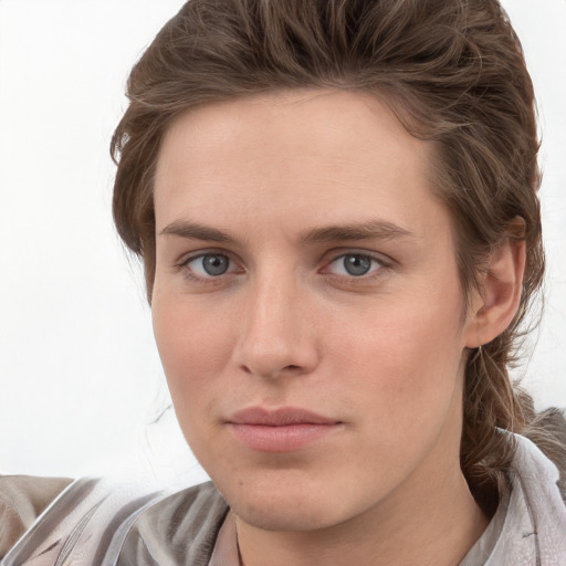 Neutral white young-adult female with medium  brown hair and grey eyes