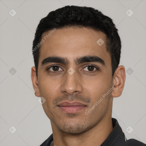 Neutral latino young-adult male with short  black hair and brown eyes