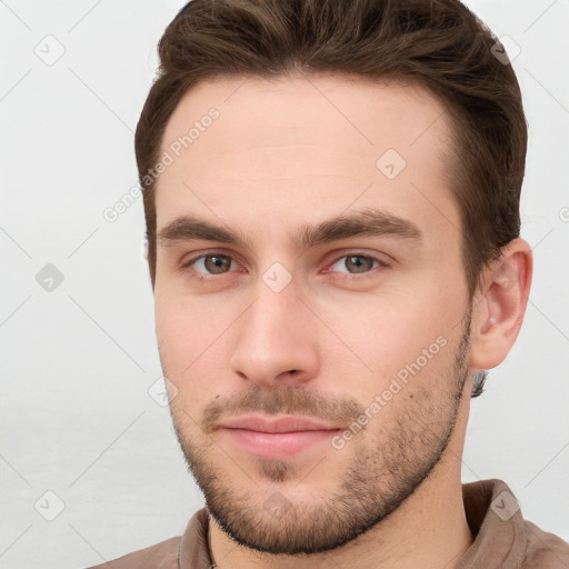 Neutral white young-adult male with short  brown hair and grey eyes