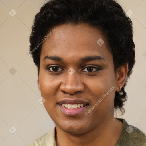 Joyful black young-adult female with short  black hair and brown eyes