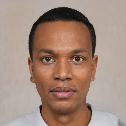 Neutral black young-adult male with short  black hair and brown eyes