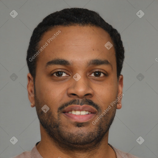 Joyful latino young-adult male with short  brown hair and brown eyes